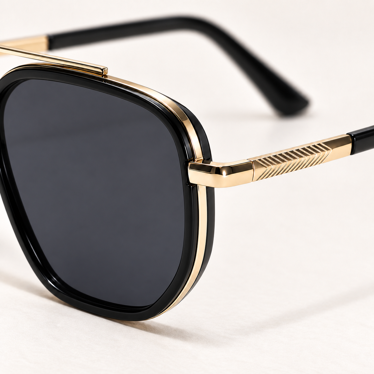 Serena Polarized Navigator Sunglasses in Black Gold - Textured temple and rim connection detail