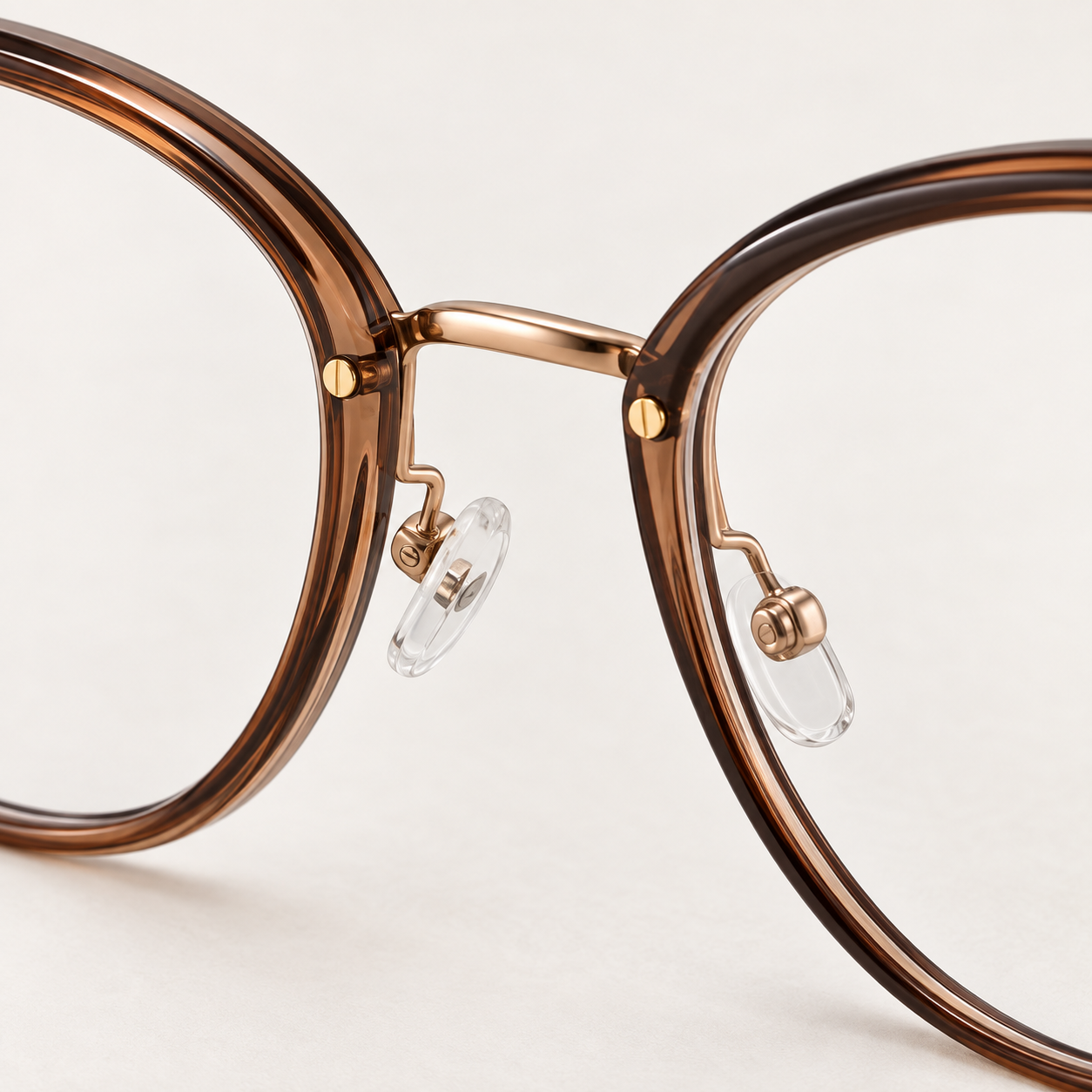 Solène Cat-Eye Frames in Tea Rose Gold - bridge and adjustable nose pads detail