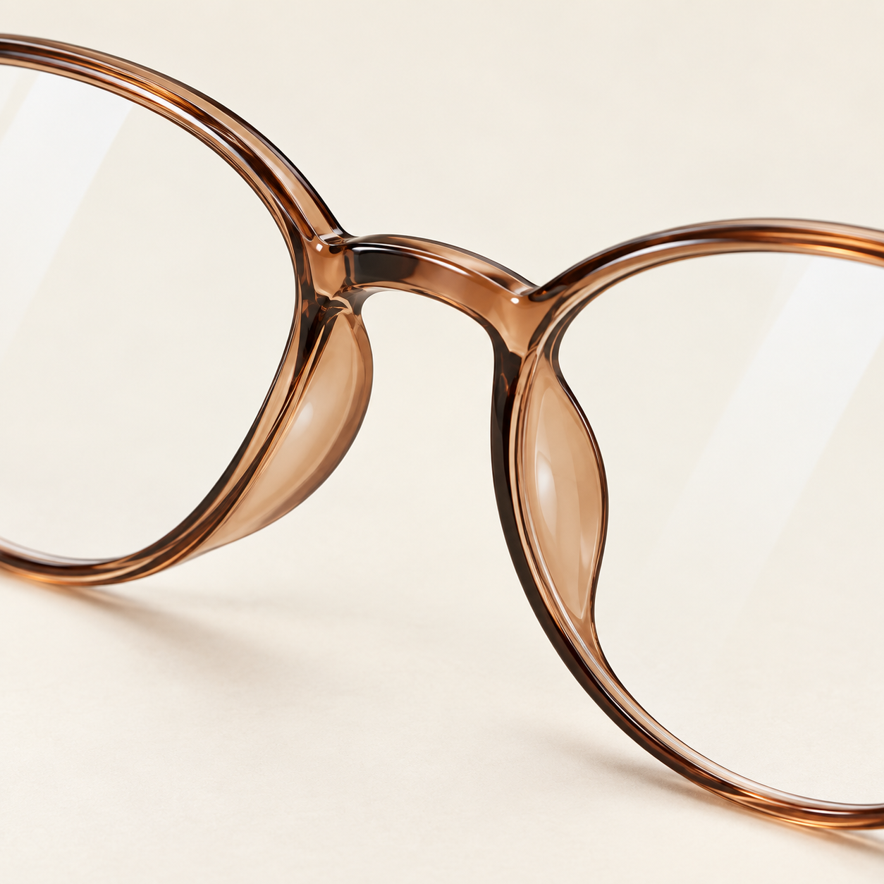 Colette Oval Frames in Tea Brown - bridge and integral molded nose rests detail