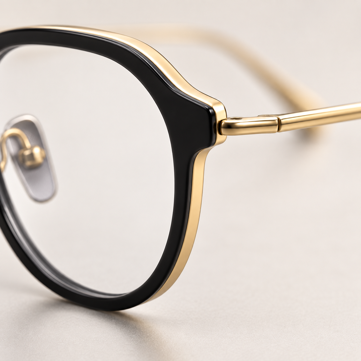 Hadley Titanium Frames in Black Gold - Layered rim and temple junction detail
