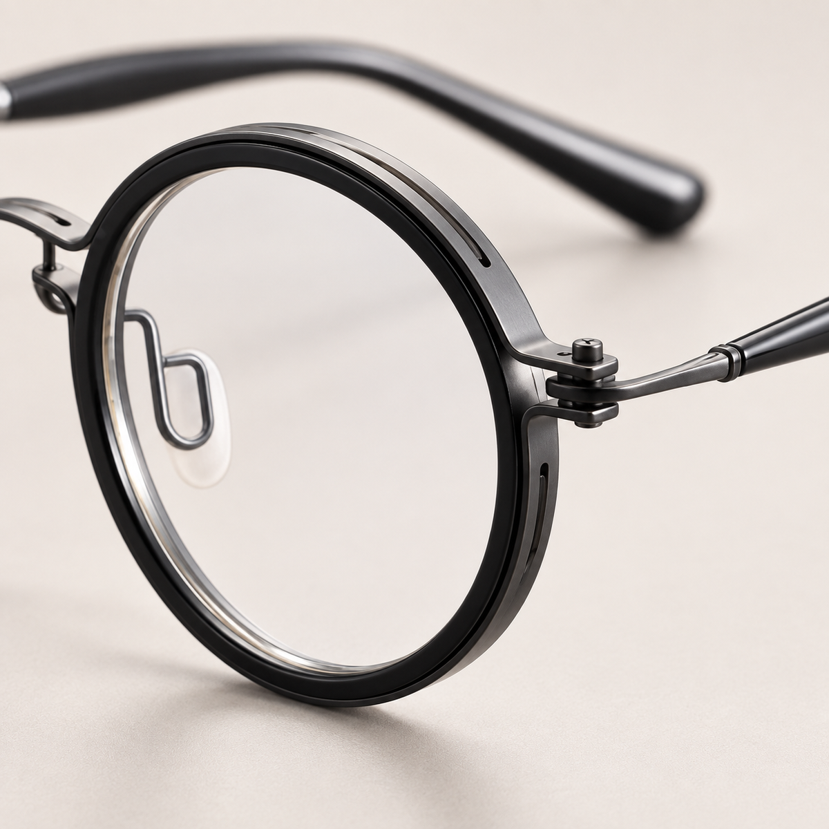 Elian Round Titanium Frames in Black - Round rim and hinge detail